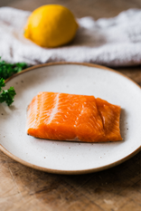 A raw fillet of sustainably caught chalk stream trout